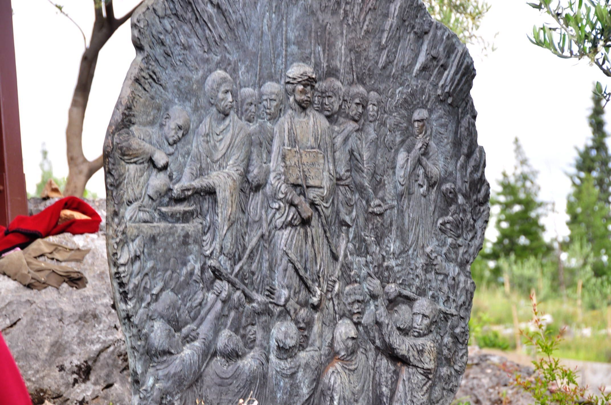A bronze relief of one of the Stations of the Cross on the path up Križevac, above Međugorje.