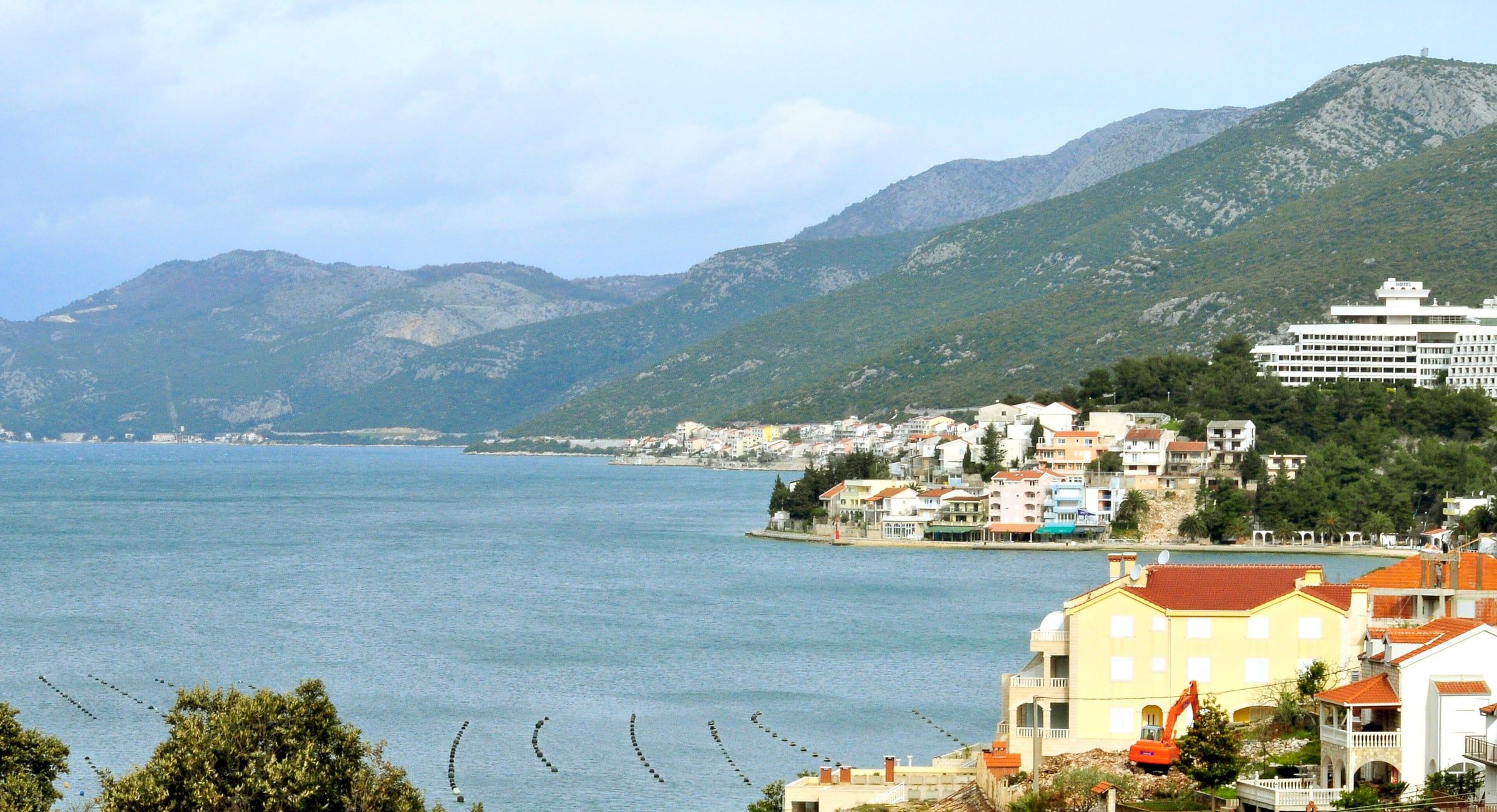 The coast at Neum, with the town seafront and the Adriatic stretching out beyond.